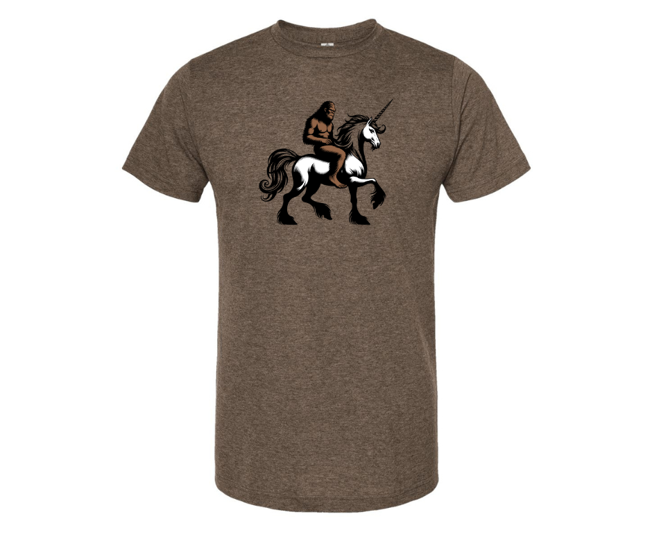 T-Shirt: T86 - Bigfoot Riding a Unicorn (H. Brown)
